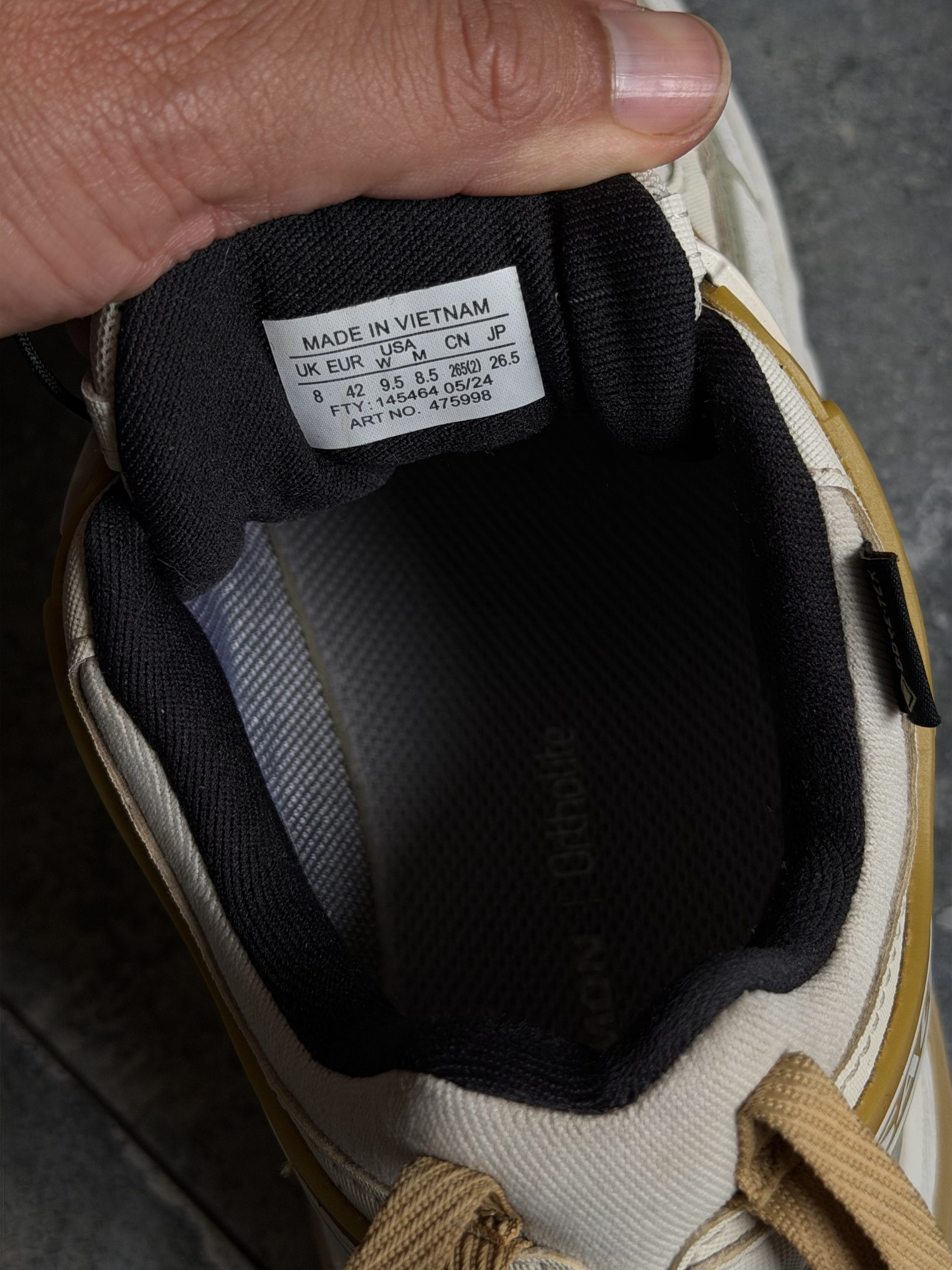 Label on the sneaker tongue reads 'MADE IN VIETNAM' with size information (UK EUR USA CN JP).